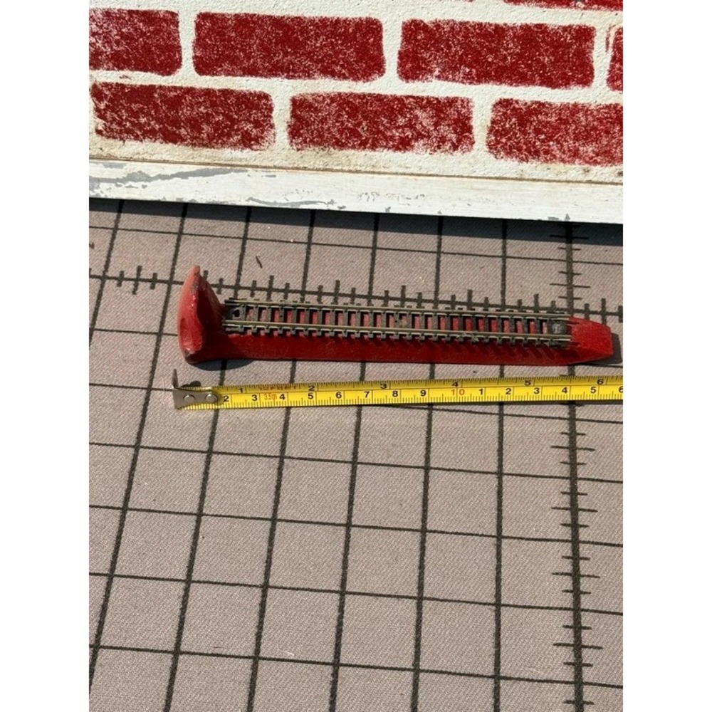 Authentic Railroad Spike with Mounted Model Train Track